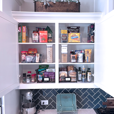 Go-To Bins organizing a kitchen cupboard