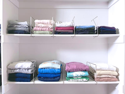 Clothes in closet organized with Shelf Dividers